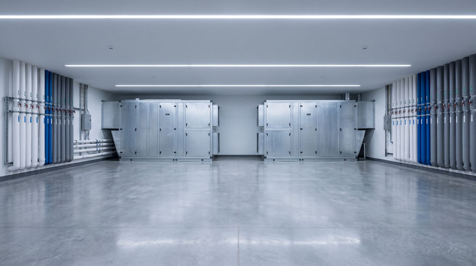 Piping and pumps inside a commercial mechanical room